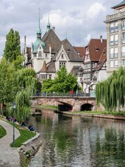 Fototapeta na wymiar Scenery of Strasbourg France on the Ill River on a sunny day