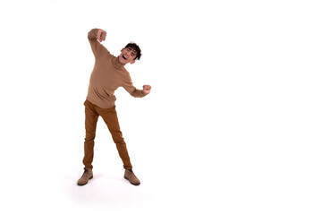 Funny guy is dancing on a white background. Human emotions. Isolate.