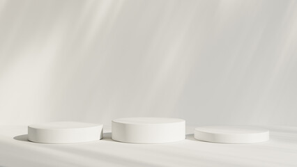 Abstract white room with realistic white cylinder pedestal podium set and leaf shadow overlay....