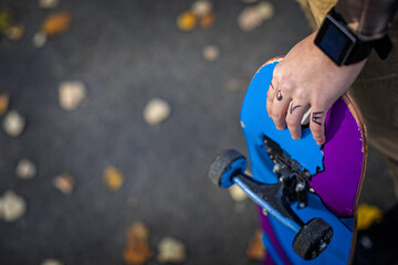 Female skater enjoys riding and jumping with her skate