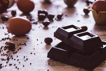 Chocolate bar and Easter eggs in the background