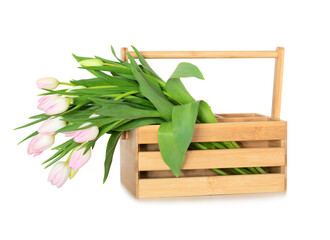 Bouquet of pink tulips in a wooden box