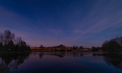 Winter sunset with color sky near Andelska Hora village with ruins and chapel