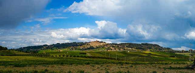View from the surrounding countryside of the village of Castagneto Carducci Livorno Tuscany Italy