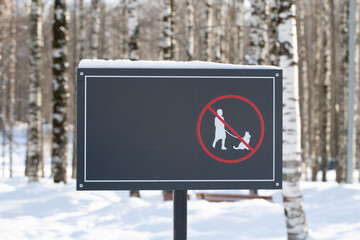 Walking with dogs is prohibited.Forbidding dog walking sign.