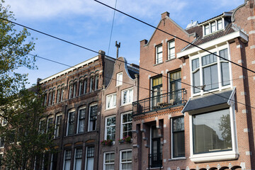 Fototapeta na wymiar Row of Beautiful Old Brick Buildings in the Leidseplein Neighborhood of Amsterdam