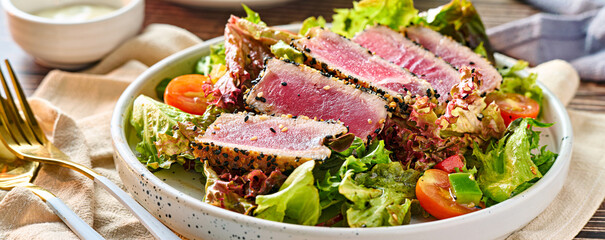 seared ahi tuna tataki salad on plate