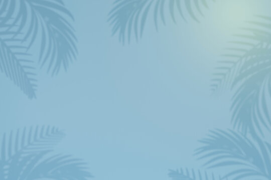 Empty palm shadow blue color texture pattern cement wall background. Summer tropical beach concept.