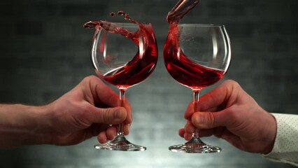 Super Slow Motion Shot of Cheering with Red Wine at 1000fps.