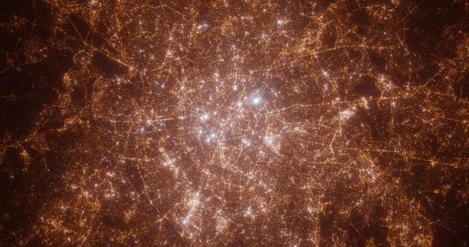 Paris (France) aerial view at night. Top view on modern city with street lights. Camera is zooming out, rotating counterclockwise. Vertical video. The north is on the left side
