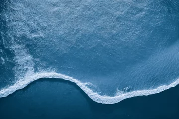  Spectacular aerial top view background photo of ocean sea water white wave splashing in the deep sea. Drone photo backdrop of sea wave in bird eye waves. © Blue Planet Studio