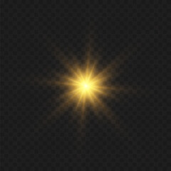 Yellow glowing light explodes on a transparent background. Bright Star. The star burst with brilliance. Golden Light effect. A flash of sunshine with rays.