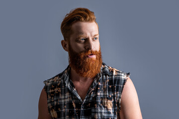 mature brutal bearded man in studio. brutal masculine man on background.