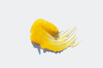 Texture of orange, yellow cosmetic care oil