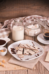 Neapolitan wafers filling with hazelnut-chocolate cream.