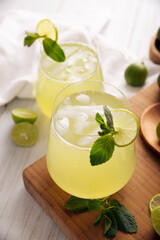 Obraz na płótnie Canvas Homemade lemonade with organic lemons and mint, a popular refreshing drink in many countries. in Mexico it is part of their traditional Aguas Frescas, where it is called Agua de Limon.