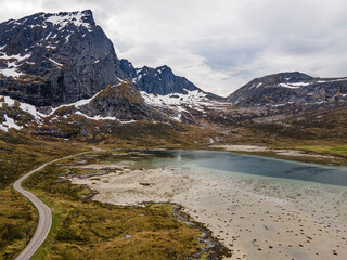 Aerial footage of Lofoten, Norway, during a sunny day with clouds