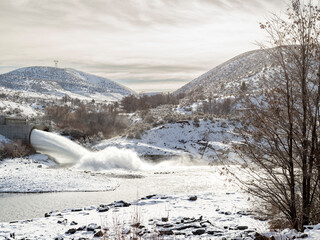 Lucky Peak Dam near Boise water outlet in winter