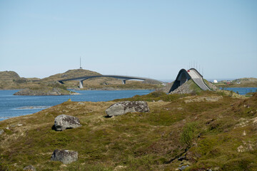 Fototapeta na wymiar Lofoten roads over pointed bridges in Norway during a sunny spring day