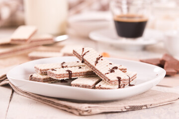 Neapolitan wafers filling with hazelnut-chocolate cream.