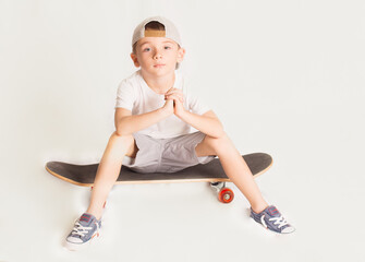 little boy skateboarding