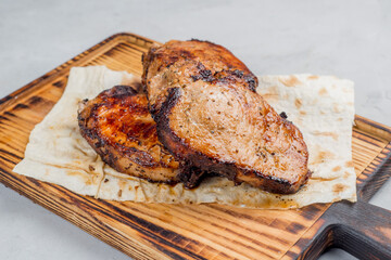 Grilled steak on the bone.
