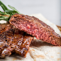 Piece of medium-roasted steak on a fork