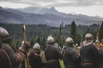 Unidentified participants at medieval fight during of international historical festival of Viking...