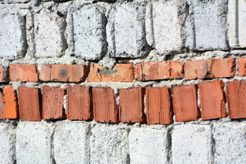 Part of the masonry wall of the building
