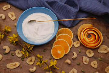 Bowl with Greek yogurt and fruit with nuts, seeds