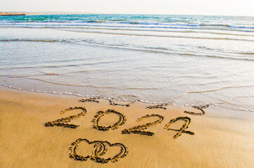 happy new year 2024 on sea beach