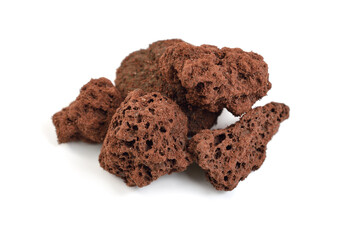 Porous brown volcanic rock isolated on white background. Lava stone, pumice stone