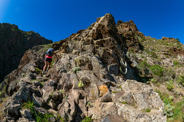 Female hiker hiking the mountains of Teno Alto in Tenerife Canary Islands