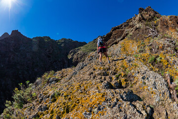 Female hiker hiking the mountains of Teno Alto in Tenerife Canary Islands