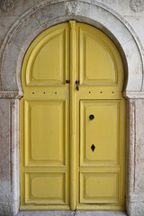 Yellow Keyhole Door with Marble Frame Full Shot Portrait, Tunis Medina