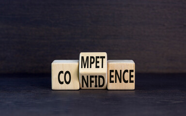 Competence and confidence symbol. Concept word Competence Confidence on wooden cubes. Beautiful...