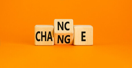 Chance and change symbol. Concept word Chance Change on wooden cubes. Beautiful orange table orange background. Business and chance and change concept. Copy space.