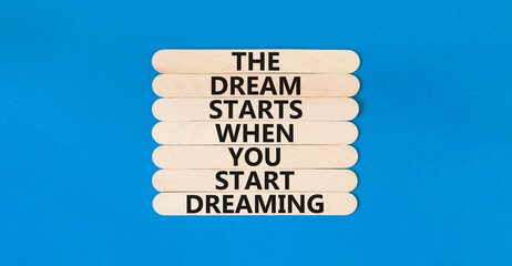 Start dreaming symbol. Concept words The dream starts when you start dreaming on wooden stick....