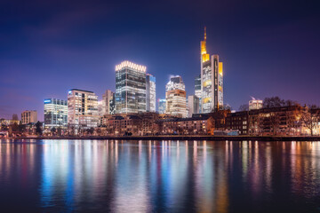Fototapeta na wymiar Illuminated Skyscrapers Frankfurt skyline at night - Frankfurt, Germany
