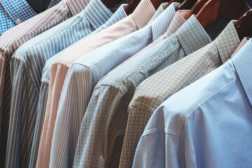 Cloth Hangers with Shirts, Closeup photo of Men, Shirts on Hangers