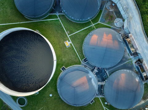 
Vertical view of the process components, fermenters and biogas storage tanks of the agricultural biogas plant. Use of biogas in cogeneration units for electricity and heat production.