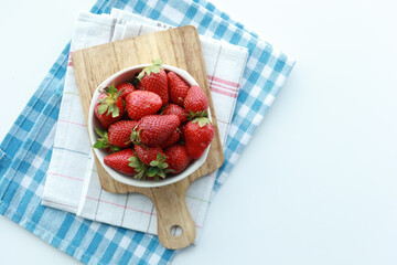  Ripe Red Strawberries in a bowl on table 