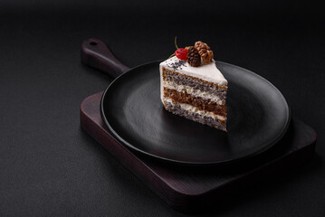 Delicious beautiful piece of cake with cream and berries