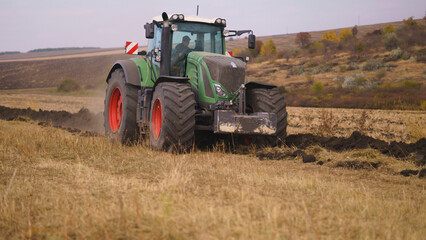 Tractor working in the field in Ukraine