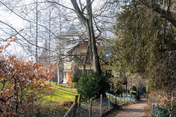 Old stately house in Seeshaupt in Bavaria at the Starnberg Lake on a slightly cloudy winter day