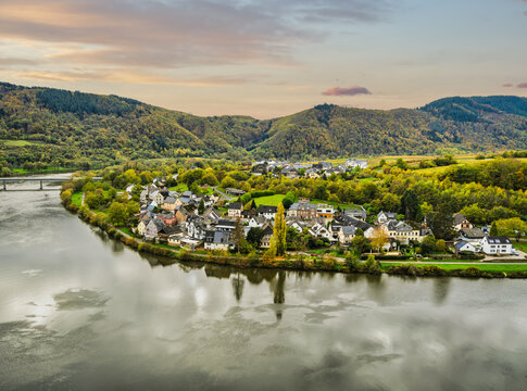Senhals village on the Moselle river bend and the mountain range in the background in Cochem-Zell district, Germany