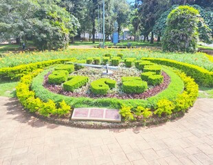 Poços de Caldas, Minas Gerais, Brazil - February 26, 2023. Floral clock next to the bandstand square in the center of Poços de Caldas.