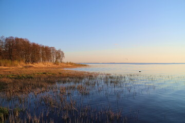 lake golden hour,  autumn landscape, yellow forest blue calm smooth water