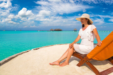 Woman lying in sunbed