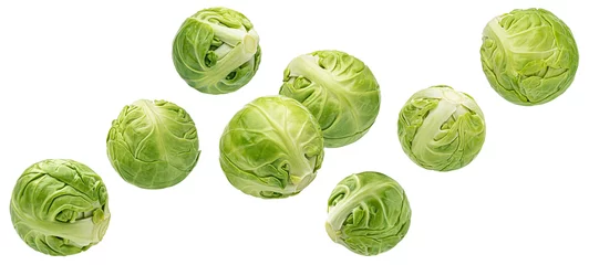 Deurstickers Falling brussels sprouts isolated on white background © xamtiw